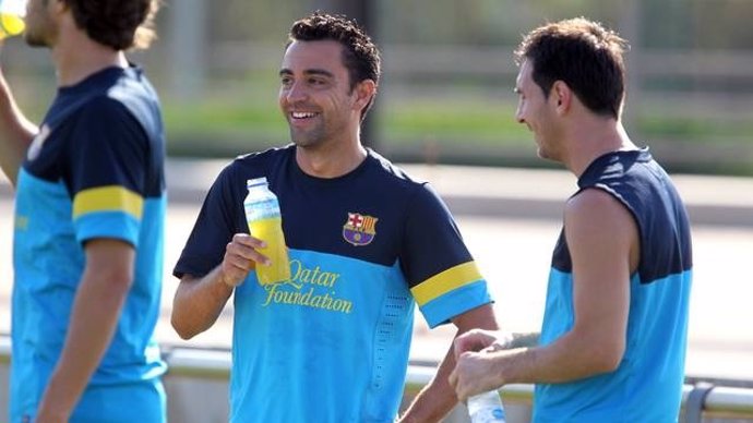 Xavi y Messi en el entrenamiento del FC Barcelona