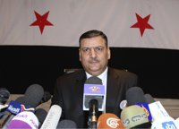 El ex primer ministro sirio Hijab discute en Qatar como acelerar la caída de Al Assad