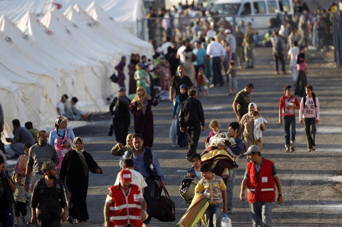 Refugiados De Siria Huyen A Turquía