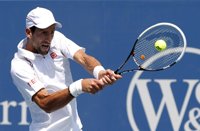 Tenis/US Open.- (Crónica) Djokovic y Roddick consiguen el paso a tercera ronda