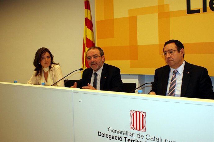 El Pte De La Diputación De Lleida J.Reñé, Con La Dtora Del SOC E. Sánchez