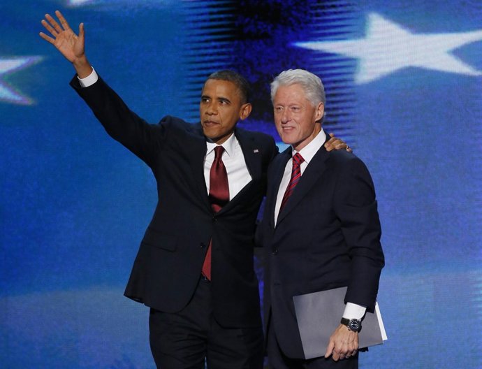 U.S. President Barack Obama joins former President Bill Clinton onstage after Cl