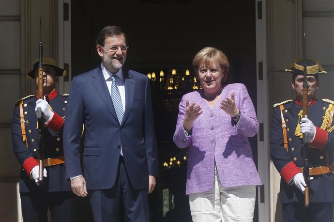 La canciller alemana, Angela Merkel, con el presidente del Gobierno, Mariano Raj