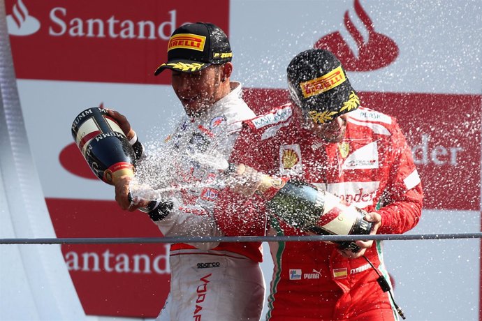 Hamilton y Alonso en el podio de Monza