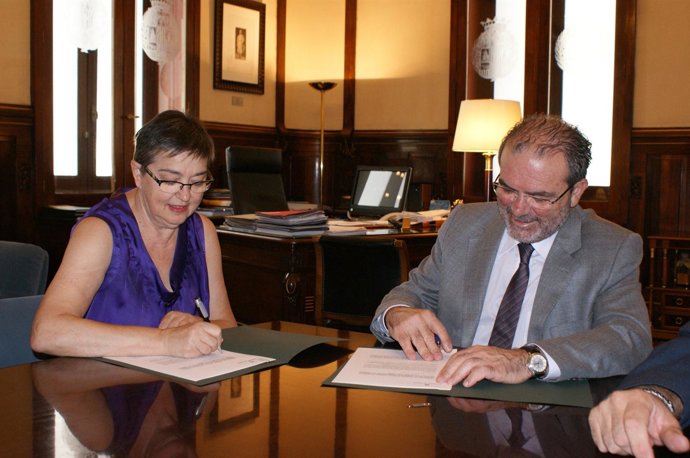 M.R.Eritja (Federación De Comercio De Lleida) Y J.Reñé (Diputación)