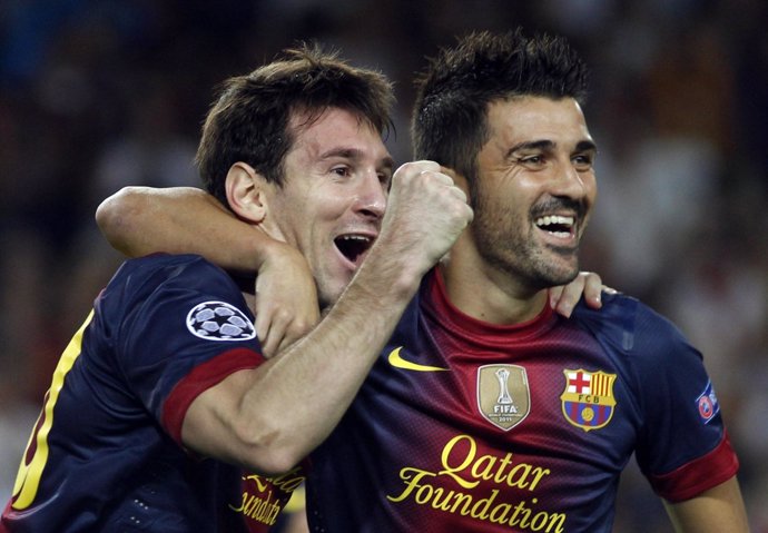 Messi y Villa celebran el tercer gol ante el Spartak