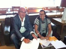 Los Representantes De ASION Y De La FTM, Durante La Firma Del Acuerdo