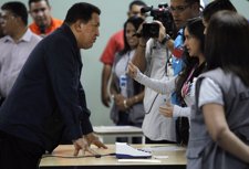  Hugo Chavez Listens To An Elect