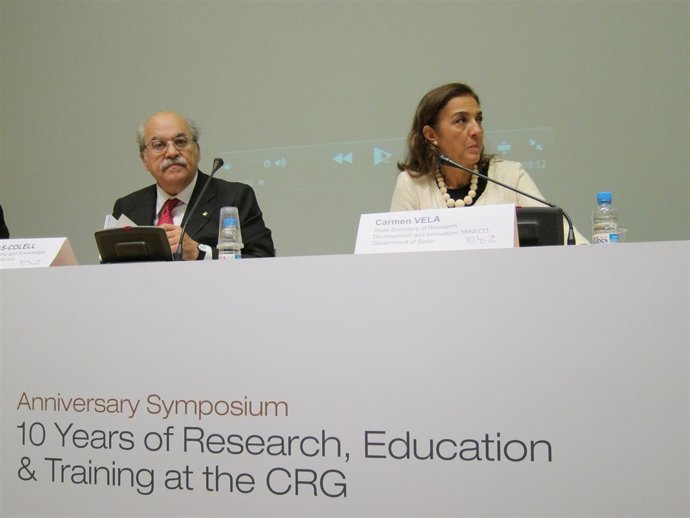 El conseller A.Mas-Colell y la secretaria de Estado C.Vela