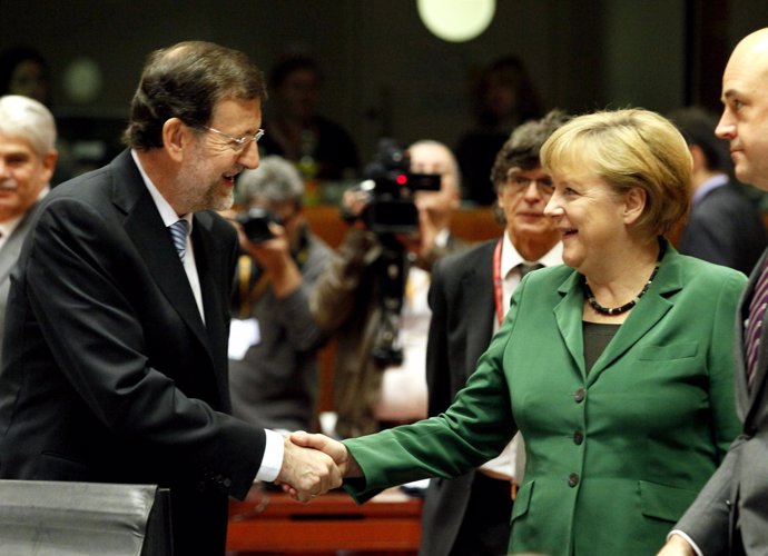 Mariano Rajoy y Angela Merkel en Bruselas