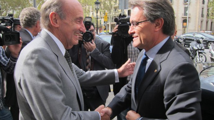 El pte de la Generalitat, A.Mas, y el político M.Roca