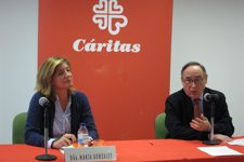 María González, de CAI, y Carlos Sauras, de Cáritas Zaragoza