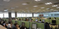 Orange inaugura un centro en Oviedo en el que internaliza su atención al cliente