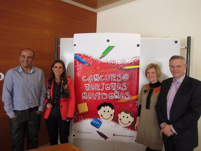 Corres y Moreno, con otros responsables del Concurso, ante el cartel anunciador