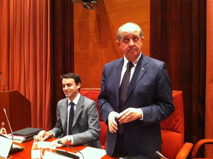 Manel Prat y Felip Puig en el Parlament