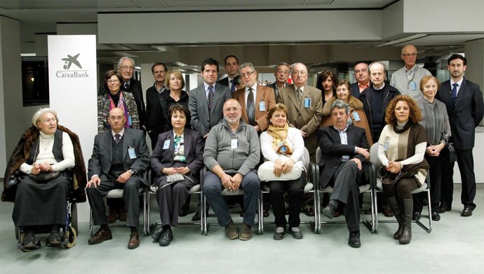 Accionistas en una visita a la sede de CaixaBank