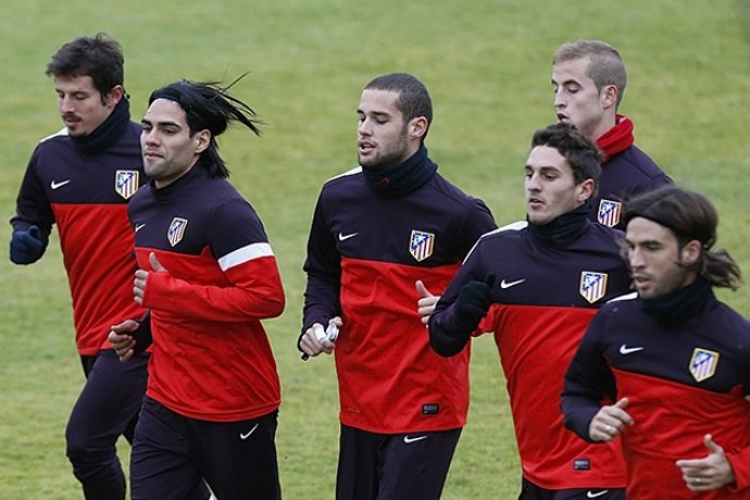 Emre Falcao Mario Súarez Koke Cisma Atlético entrenamiento
