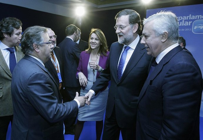 Rajoy, junto a Arenas y Zoido