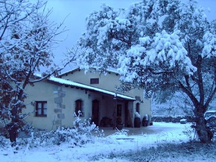 Un alojamiento rural nevado