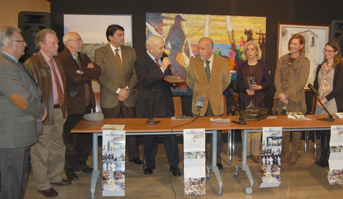 Miguel Valor y Juan Antonio Poblador, con artistas en la Lonja