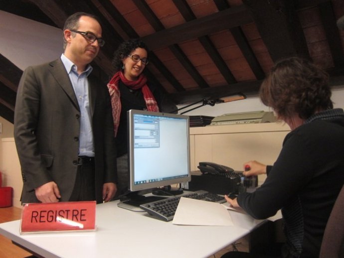 J.Turull (CiU) y M.Rovira (ERC), en el Parlament