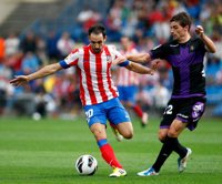 Fútbol.- Juanfran y los canteranos Javi Manquillo y Óliver Torres entran en la convocatoria contra el Athletic Club