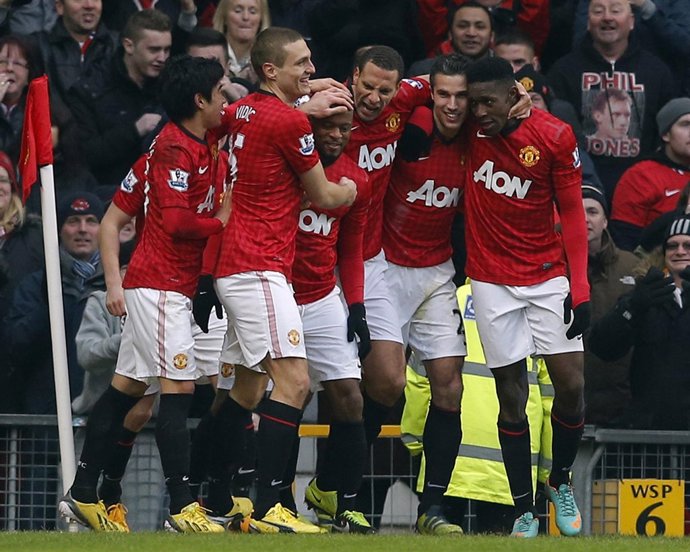 El Manchester United celebra un gol ante el Liverpool