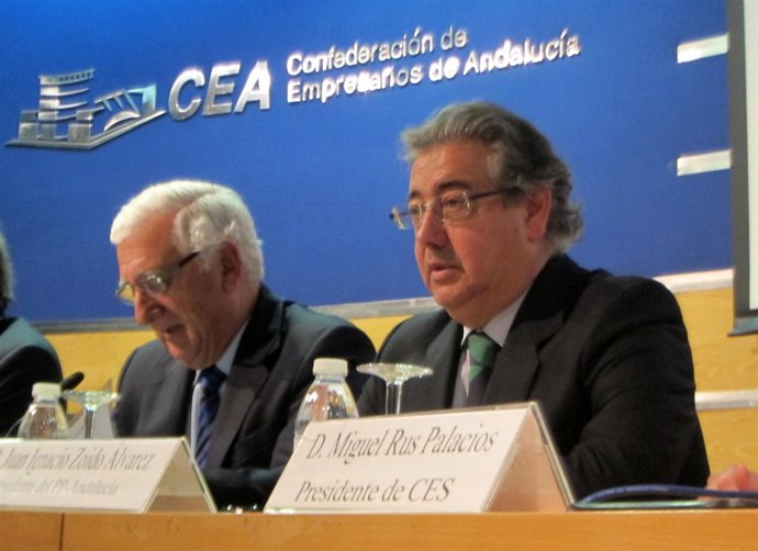 El presidente de CEA, Santiago Herrero y el presidente PP-A, Juan Ig. Zoido