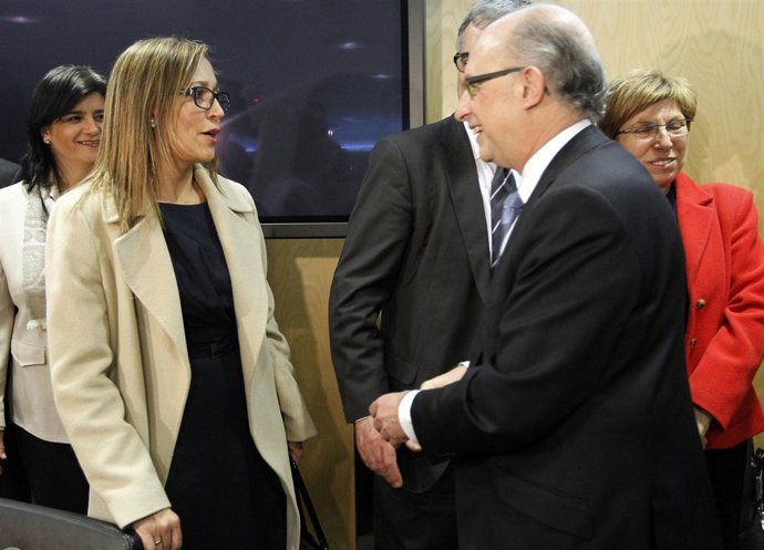 La conselleira de Facenda, Elena Muñoz, con el ministro Montoro en el CPFF