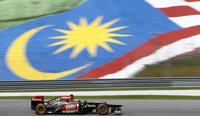 Fórmula 1/GP Malasia.- Raikkonen, sancionado con tres posiciones en parrilla por estorbar a Rosberg