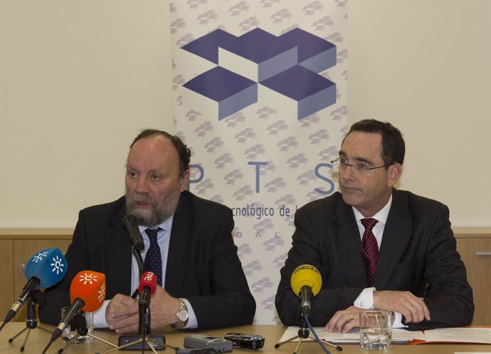 Rector de la UGR, González Lodeiro, y el vicepresidente de Abbott, Robert Miller