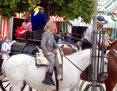 Niña a caballo en la Feria de Abril