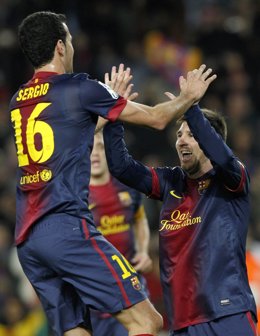 Sergio Busquets y Leo Messi (FC Barcelona)