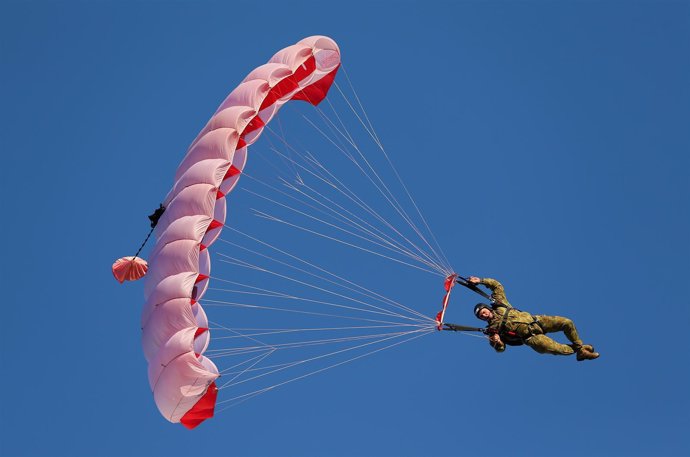 SYDNEY, AUSTRALIA - APRIL 25: An Australian army para-trooper parachutes into th