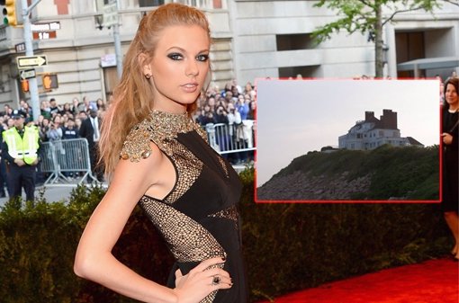 Taylor Swift en la gala Met 2013 con foto de su mansión