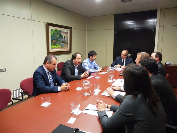 El conseller F.Puig y miembros de la empresa Rakuten