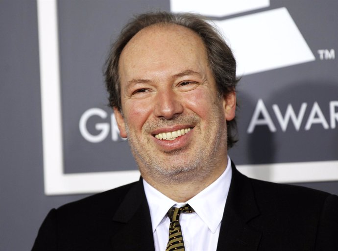 Oscar-winning composer Hans Zimmer smiles as he arrives at the 53rd annual Gramm