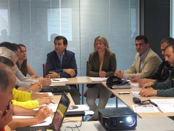 Company y Riera en una reunión