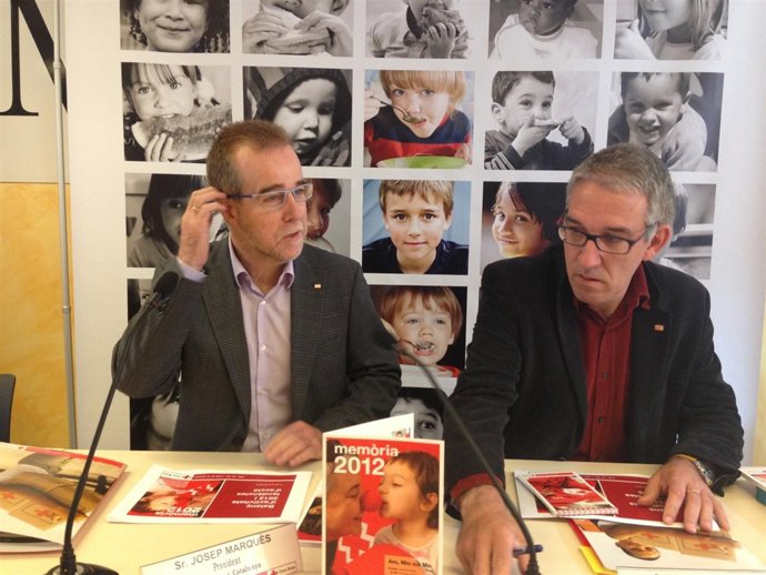 El pte.De Creu Roja Catalunya, J.Marquès, y el coordinador de Creu Roja E.Morist