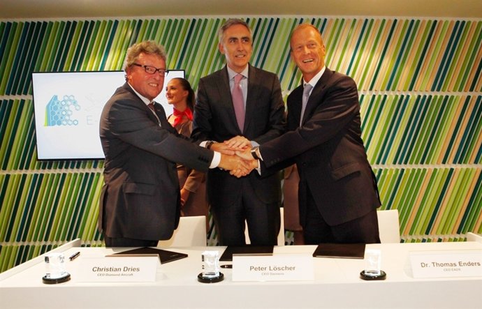 Tom Enders, Peter Löscher y Christian Dries