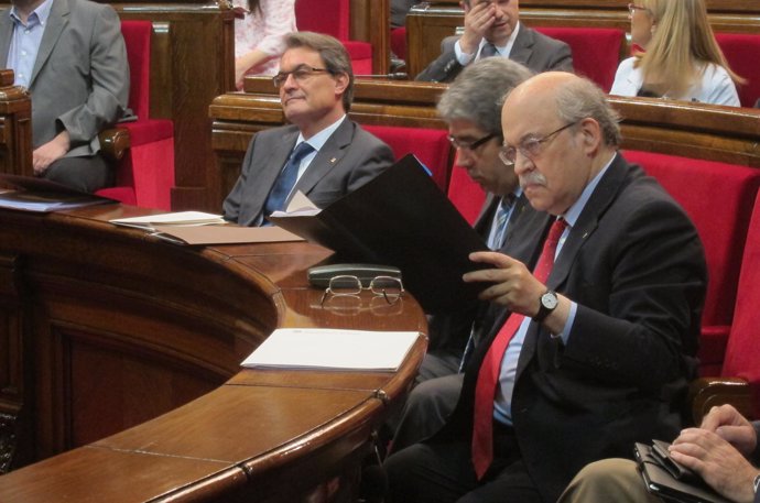 A.Mas, F.Homs y A.Mas-Colell, en el Parlament