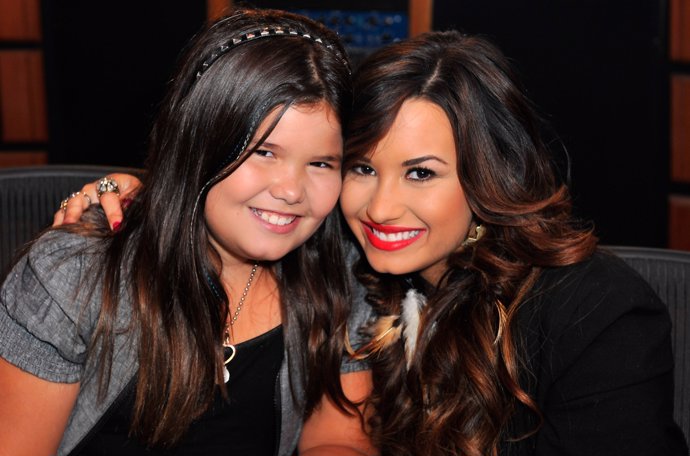 HOLLYWOOD, CA - JULY 21:  Actress/singer Demi Lovato (R) and sister actress Madi