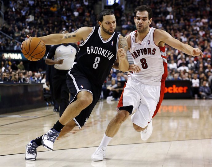 Deron Williams (Brooklyn Nets) y José Manuel Calderón (Toronto Raptors)