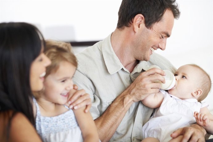 Padres con sus hijos