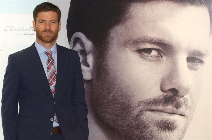 MADRID, SPAIN - APRIL 16:  Real Madrid player Xabi Alonso presents the new "Emid