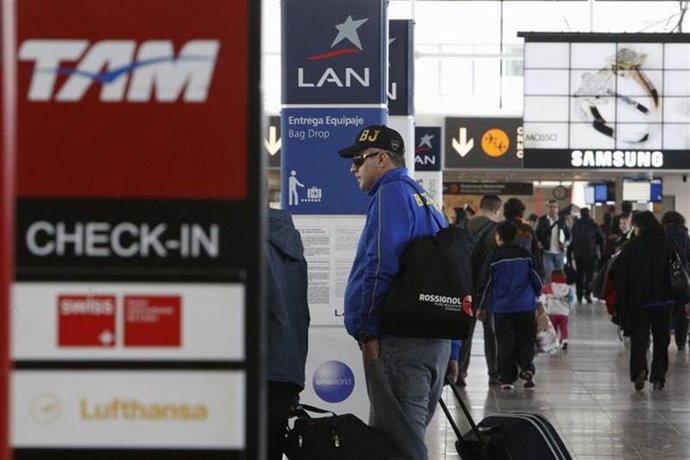 Los puntos de embarque de la aerolínea chilena LAN y la brasileña TAM, ahora fus