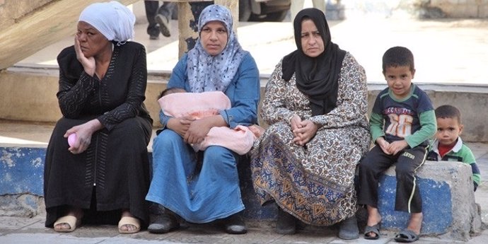 Mujeres y niños palestinos refugiados en Siria.