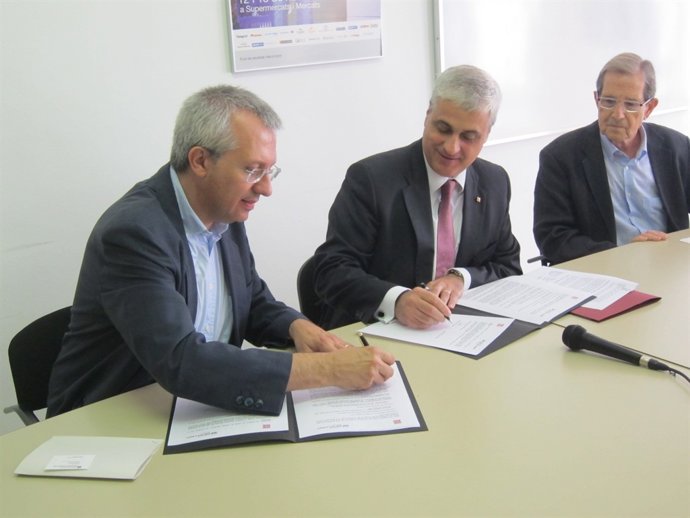 J.M.Forné (Fed.Cat.Bancos de Alimentos) y el conseller de Justicia G.Gordó