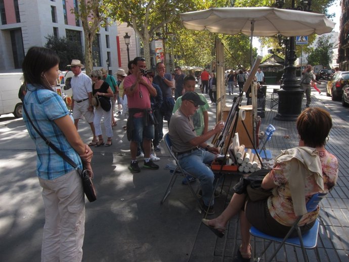 Un caricaturista de La Rambla.