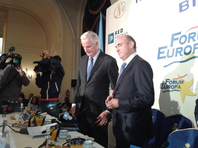 Luis de Guindos y Michel Barnier